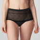 Front view of a woman wearing the Sophora high-waisted cheeky panty in Black by PrimaDonna.
