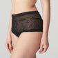 Side view of a woman wearing the Sophora high-waisted cheeky panty in Black by PrimaDonna.