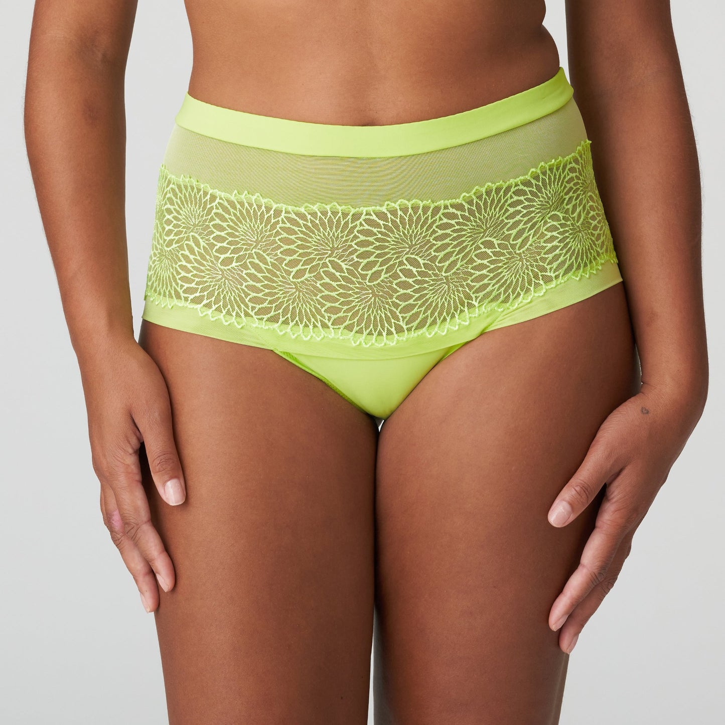 Front view of a woman wearing the Sophora high-waisted cheeky panty in Lime Crush by PrimaDonna.