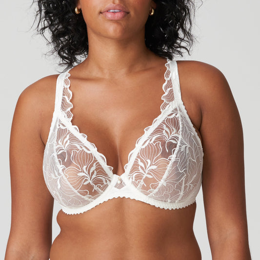 Front view of a woman wearing a white lace DD+ bra with plunge neckline by Primadonna.