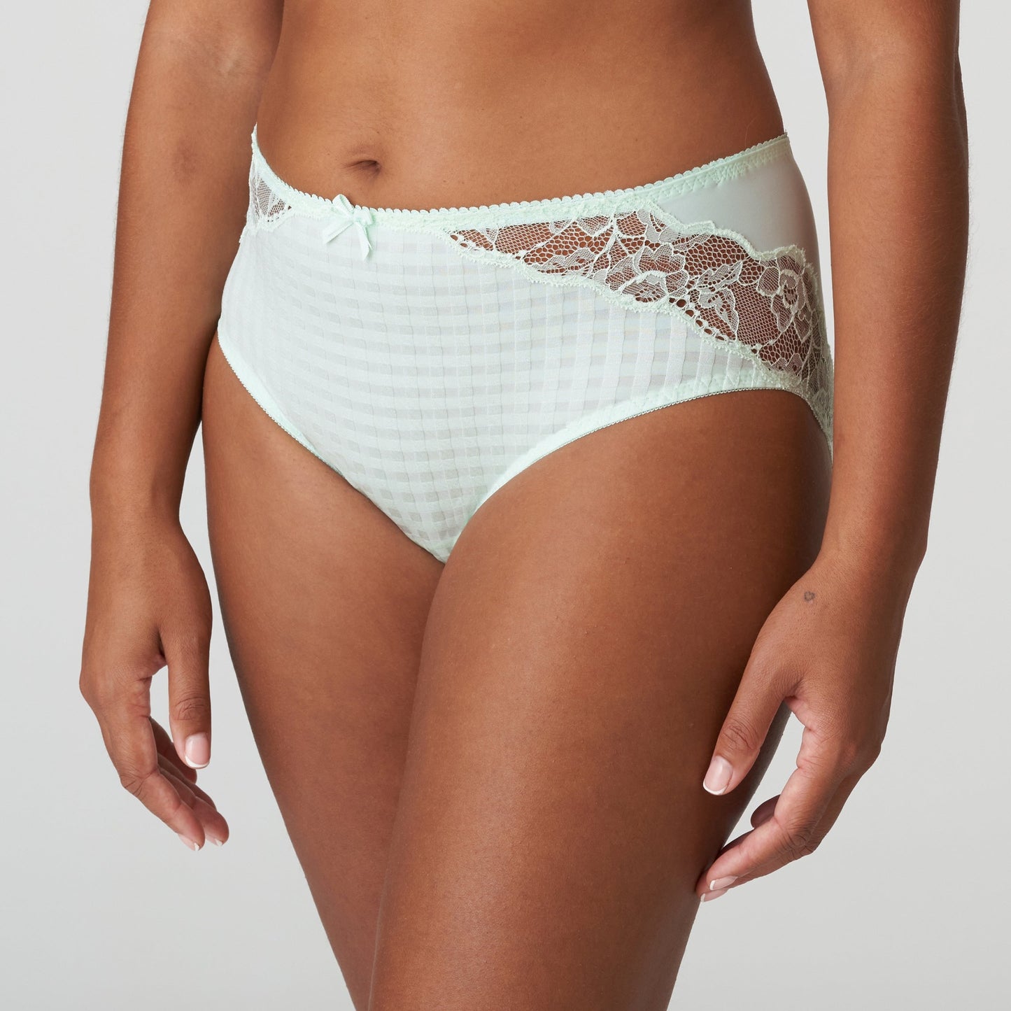 Side view of a woman wearing the Madison Full Brief panty with lace in Duck Egg by PrimaDonna.