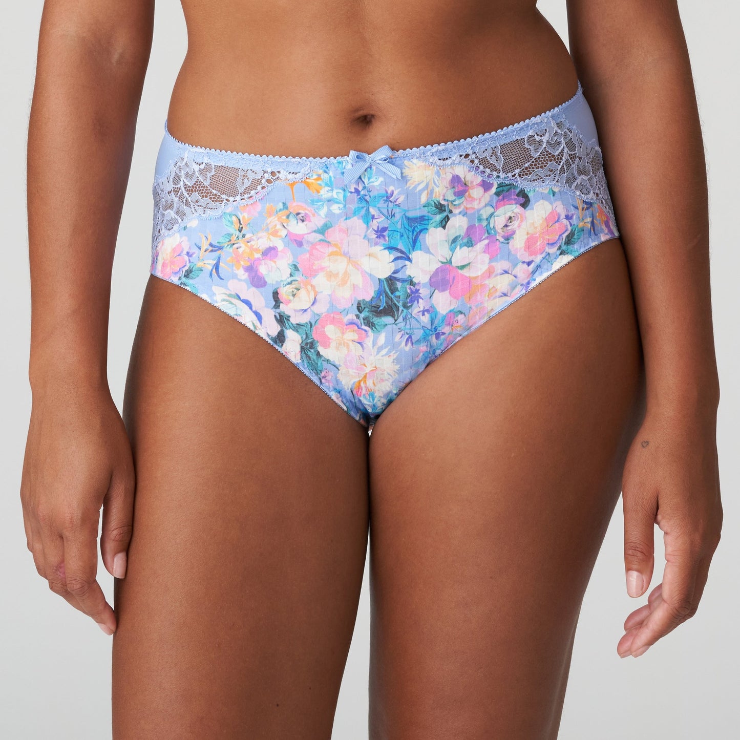 Front view of a woman wearing the Madison Full Brief panty with lace in Periwinkle Floral by PrimaDonna.