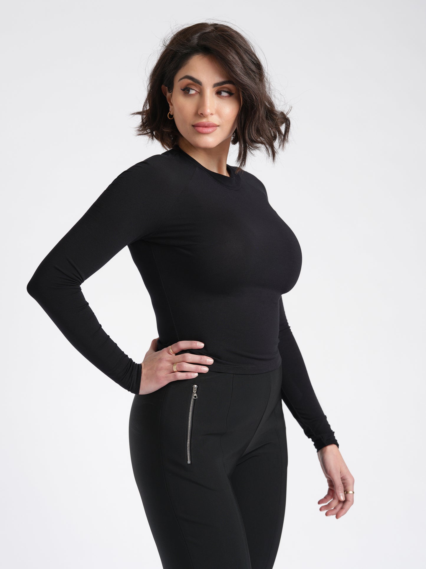 Brie pullover black side view long sleeve raglan.