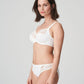 Side view of a woman wearing the DD+ Madison full cup bra in Natural by PrimaDonna.