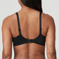 Back view of a woman wearing the DD+ Madison Unpadded Seamless T-Shirt Bra in Black by PrimaDonna.