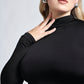 Close up detail of a woman wearing a black stretch viscose fuller bust long sleeve mock neck pullover by Miriam Baker.
