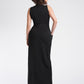 Back view of a size 6 woman wearing a luxury fuller bust stretch viscose evening dress with oversized patch pockets and waist sash detail by Miriam Baker.