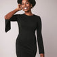 Woman wearing a black stretch viscose fuller bust princess line split sleeve bodycon dress with a crew neck and invisible zipper designed by Miriam Baker.