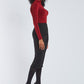 Side view of a woman wearing a red stretch viscose fuller bust long sleeve mock neck pullover by Miriam Baker.