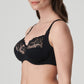 Side view of a woman wearing a supportive full cup underwire bra for large breasts in black by PrimaDanna.