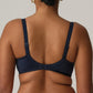 Back view of a woman wearing a supportive full cup underwire bra for large breasts in velvet blue by PrimaDanna.