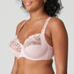 Side view of a woman wearing a supportive full cup underwire bra for large breasts in vintage pink by PrimaDanna.