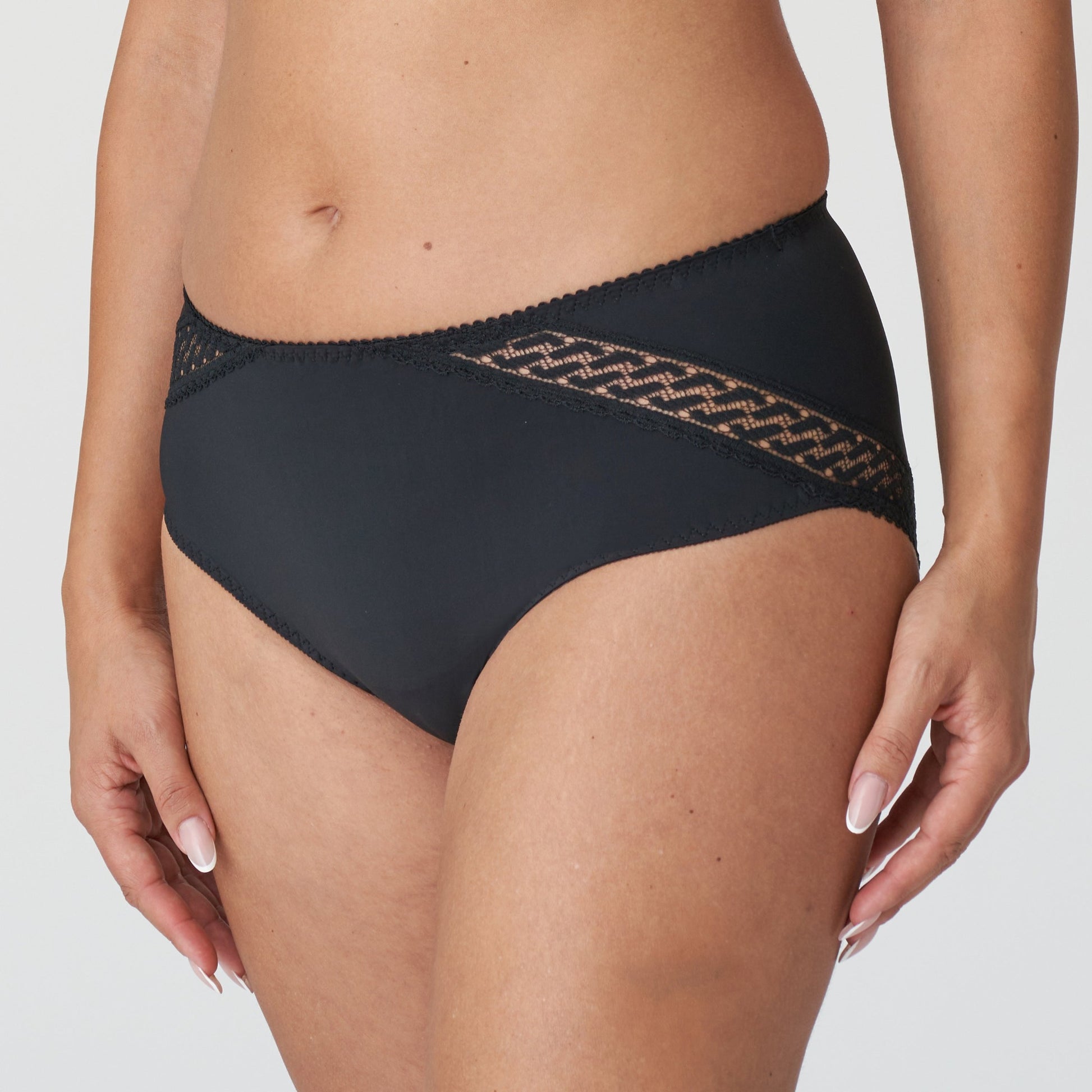 Side view of a woman wearing the Montara Full Brief panty in Black designed by PrimaDonna.