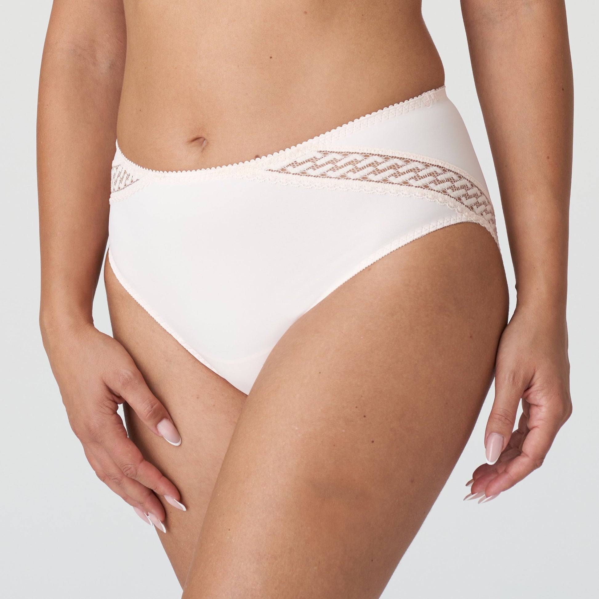 Side view of a woman wearing the Montara Full Brief in Crystal Pink designed by PrimaDonna.