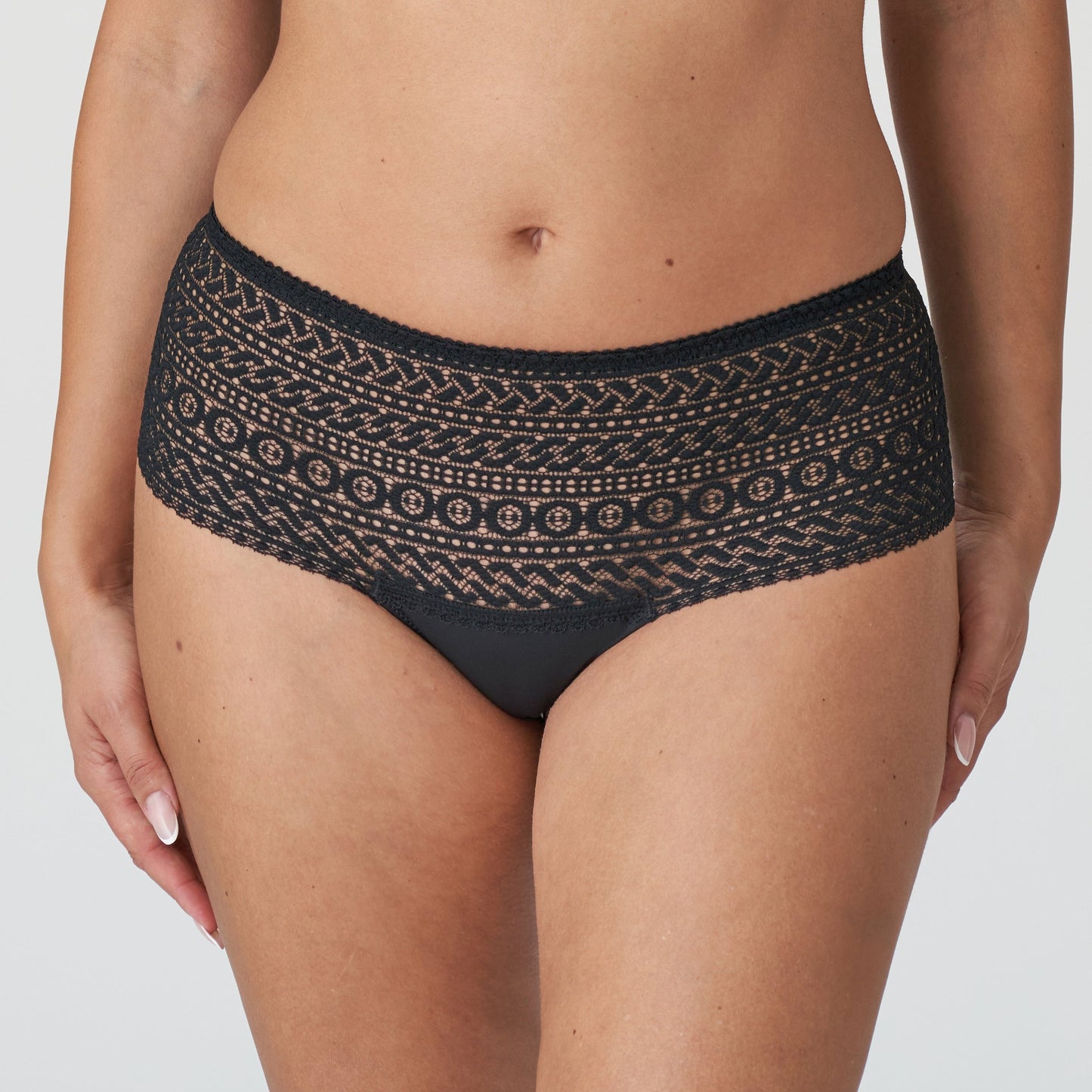 Front view of a woman wearing the Montara luxury thong with all over lace design in Black by PrimaDonna.