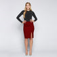 Front view of a woman wearing a red knee length stretch viscose pencil skirt with side slit and back invisible zipper by Miriam Baker.