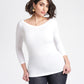 Woman wearing a white 3/4 length sleeve fuller bust bamboo pullover with stylized boatneck by Miriam Baker.