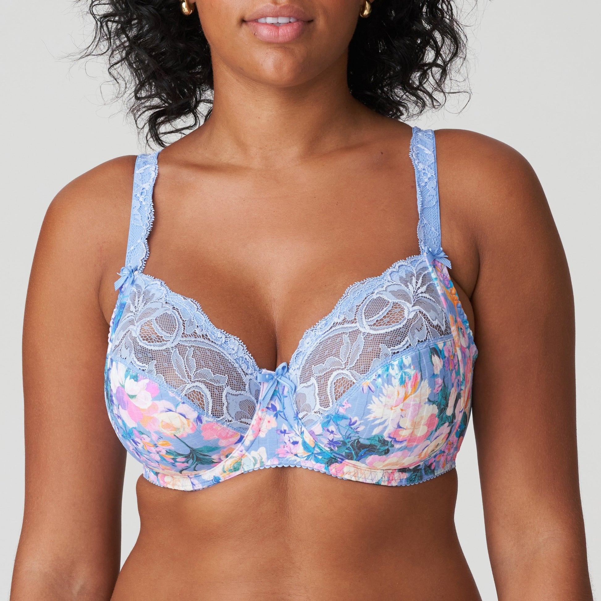 Front view of a woman wearing the DD+ Madison Full Cup Bra in Periwinkle Floral by PrimaDonna.
