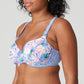Side view of a woman wearing the Madison Moulded Cup Bra with light padding in Periwinkle Floral by Primadonna.
