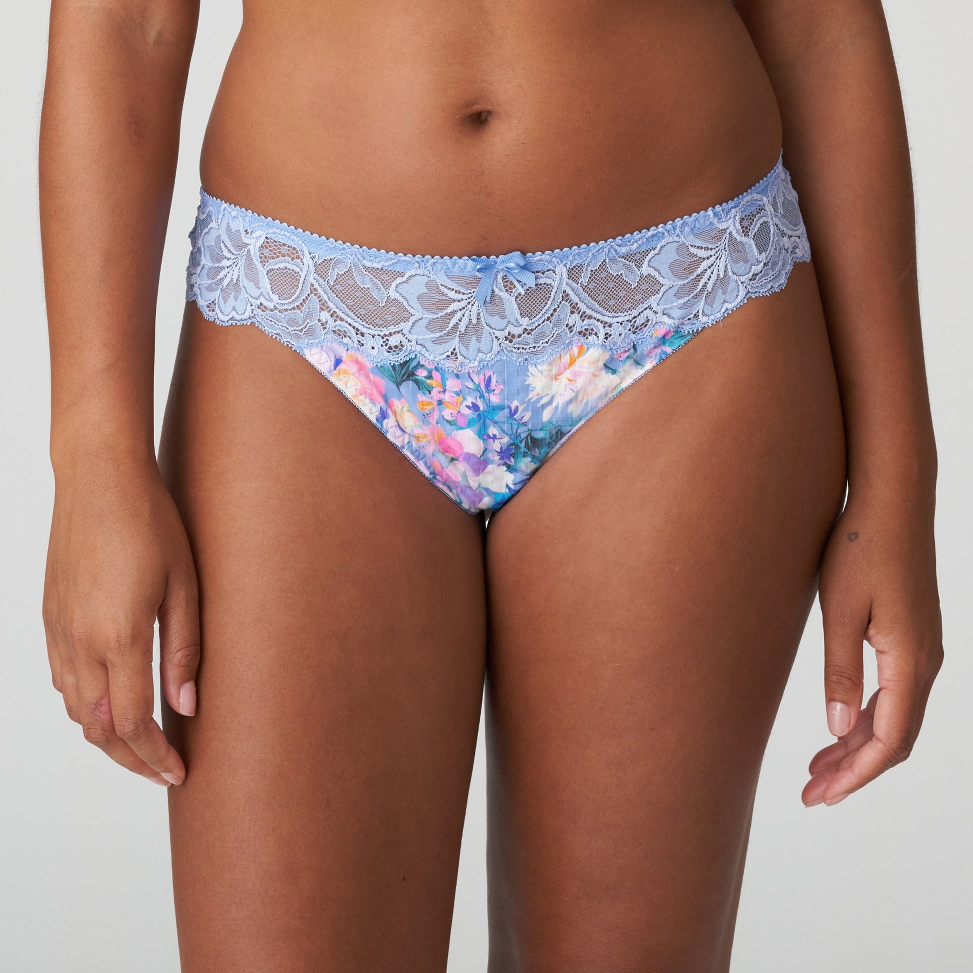 Front view of a woman wearing the Madison Thong in Periwinkle Floral by PrimaDonna.