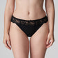 Front view of a woman wearing the Madison Thong in Black by PrimaDonna.