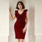 Woman wearing a stretch viscose fuller bust v-neck sheath dress with ruffles that frame the neckline in red designed by Miriam Baker.